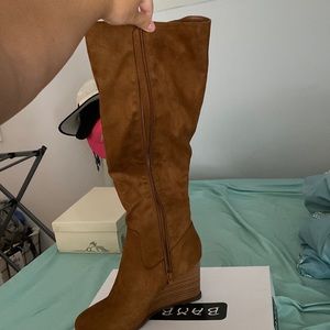 Brown knee high boots
